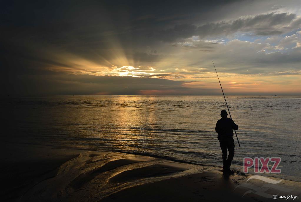 vissen bij zonsondergang