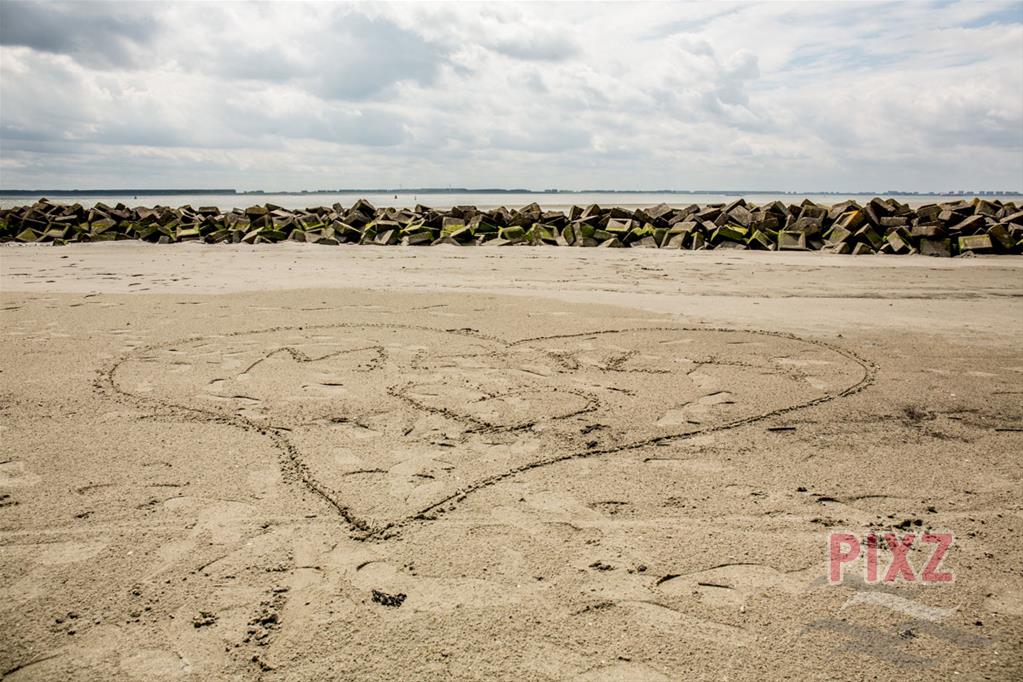 love is in the sand