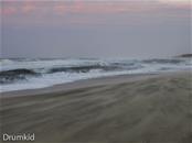 Grote golven en veel zand